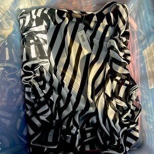 Chicos blouse top. Short sleeve. Very cute. New with tags. Size 1